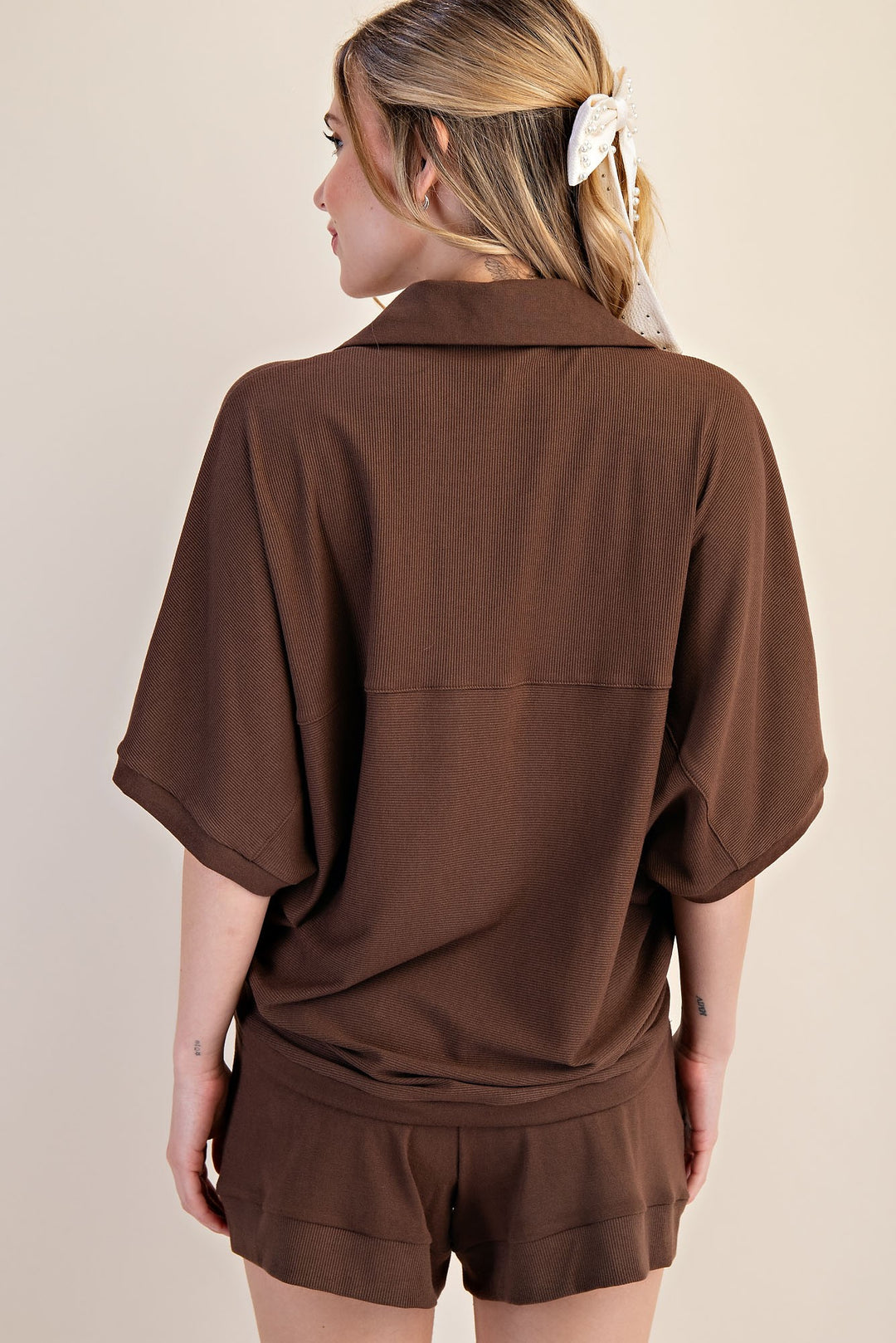 Turning Around Brown Top