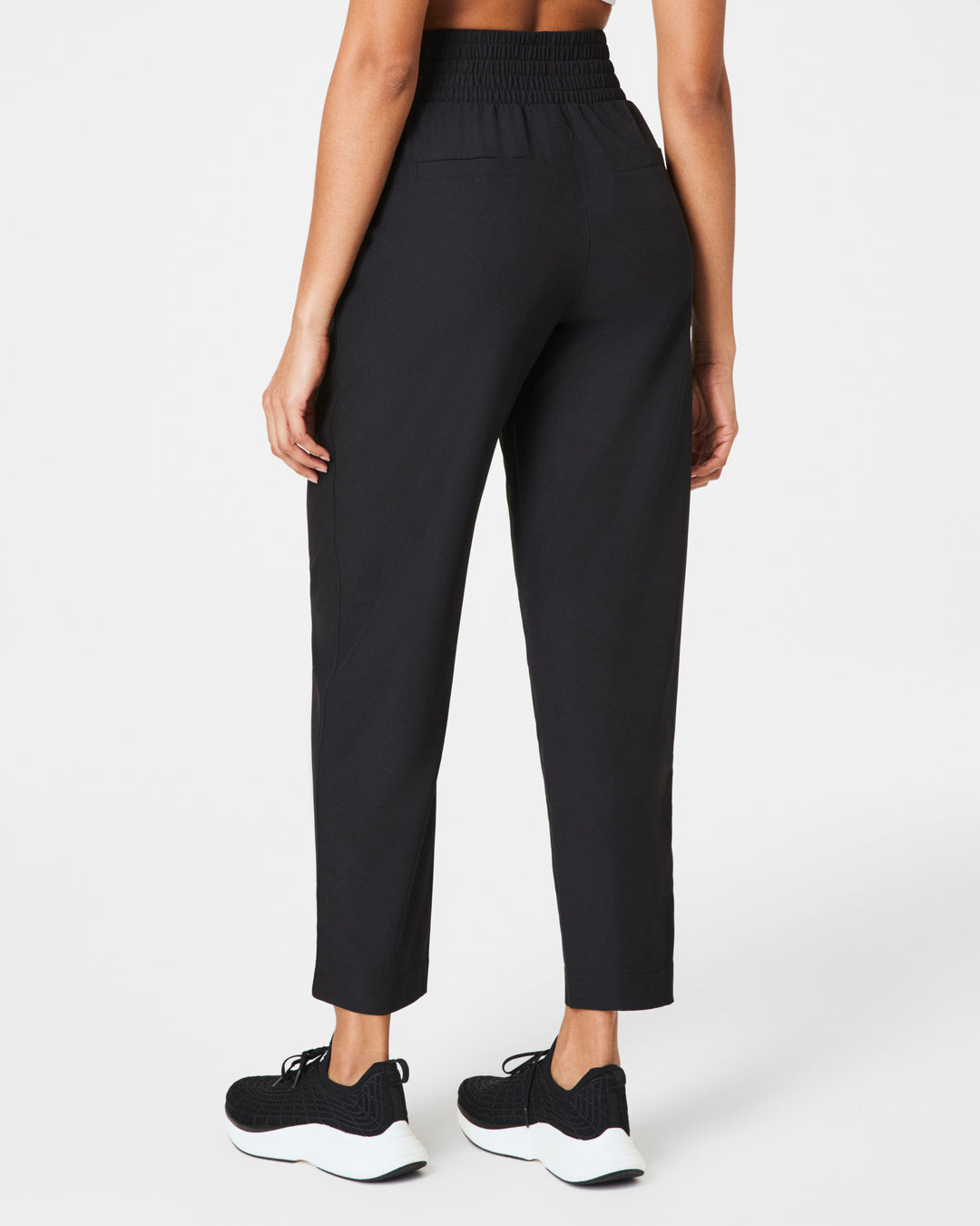 SPANX® On The Move Slim Pant in Very Black